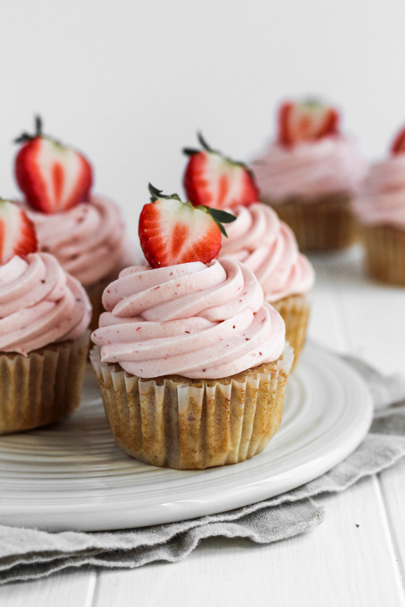 Dish with strawberry cupcakes