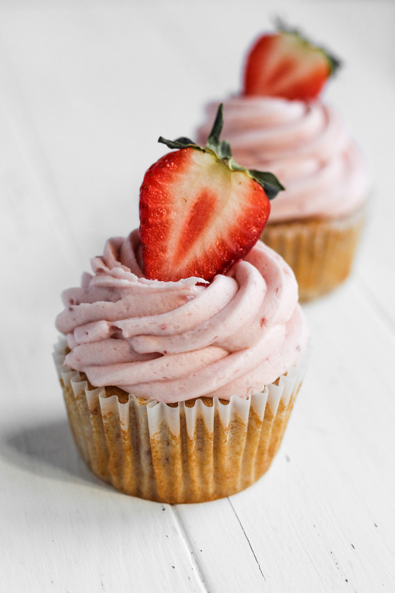 Two strawberry cupcakes