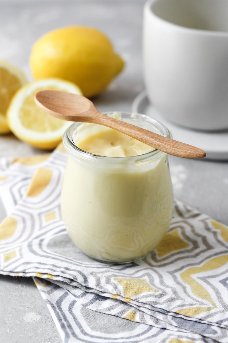 Jar of homemade lemon cream with spoon