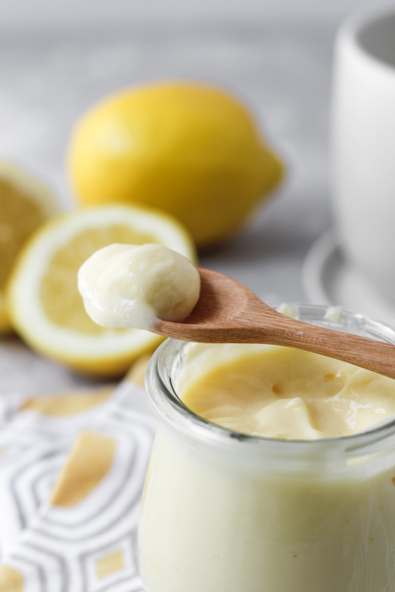 Jar of homemade lemon cream with spoon