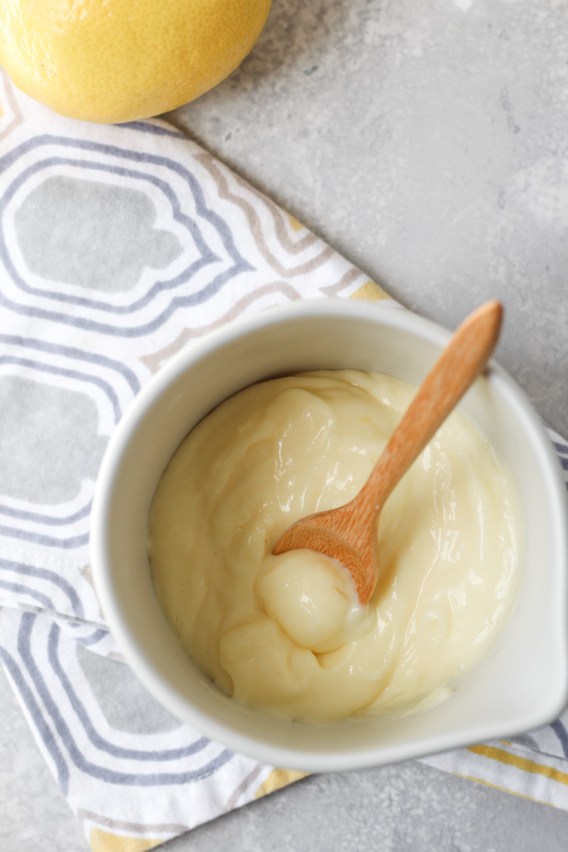 Jar of homemade lemon cream with spoon