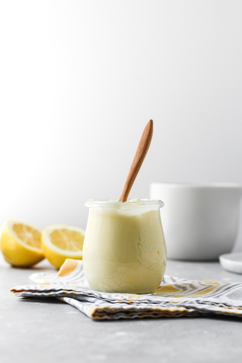 Jar of homemade lemon cream with spoon