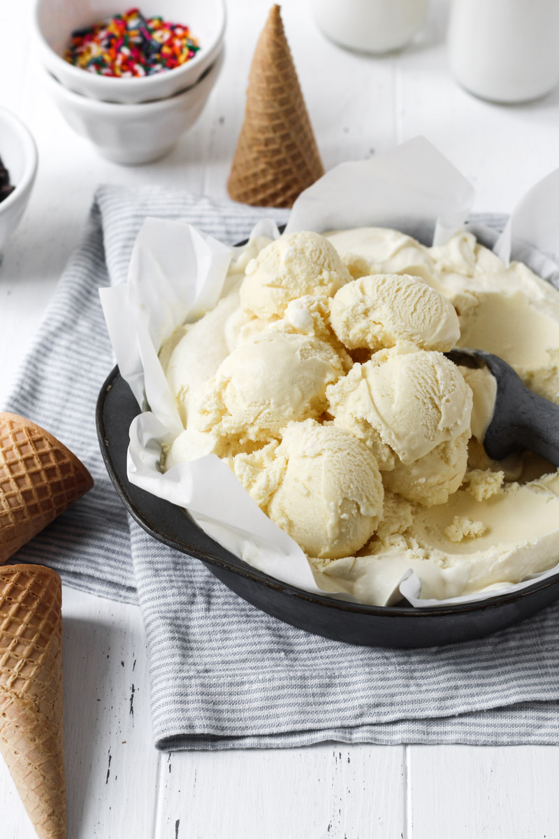 Large bowl of vanilla ice cream.