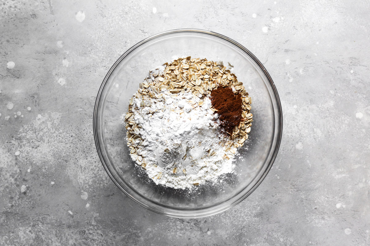 Dry ingredients in a bowl for banana oat muffins.