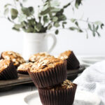 Stack of two banana muffins in a small plate.