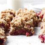 Side view of plum bars cut into squares.