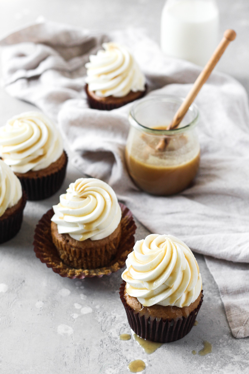 Sweet potato cupcakes with salted maple caramel cream cheese frosting and a caramel drizzle.