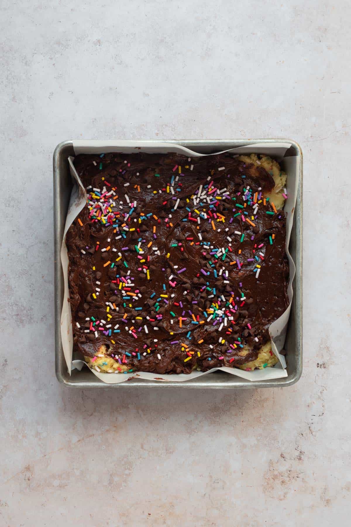 Baking pan with birthday cake brownie batter.