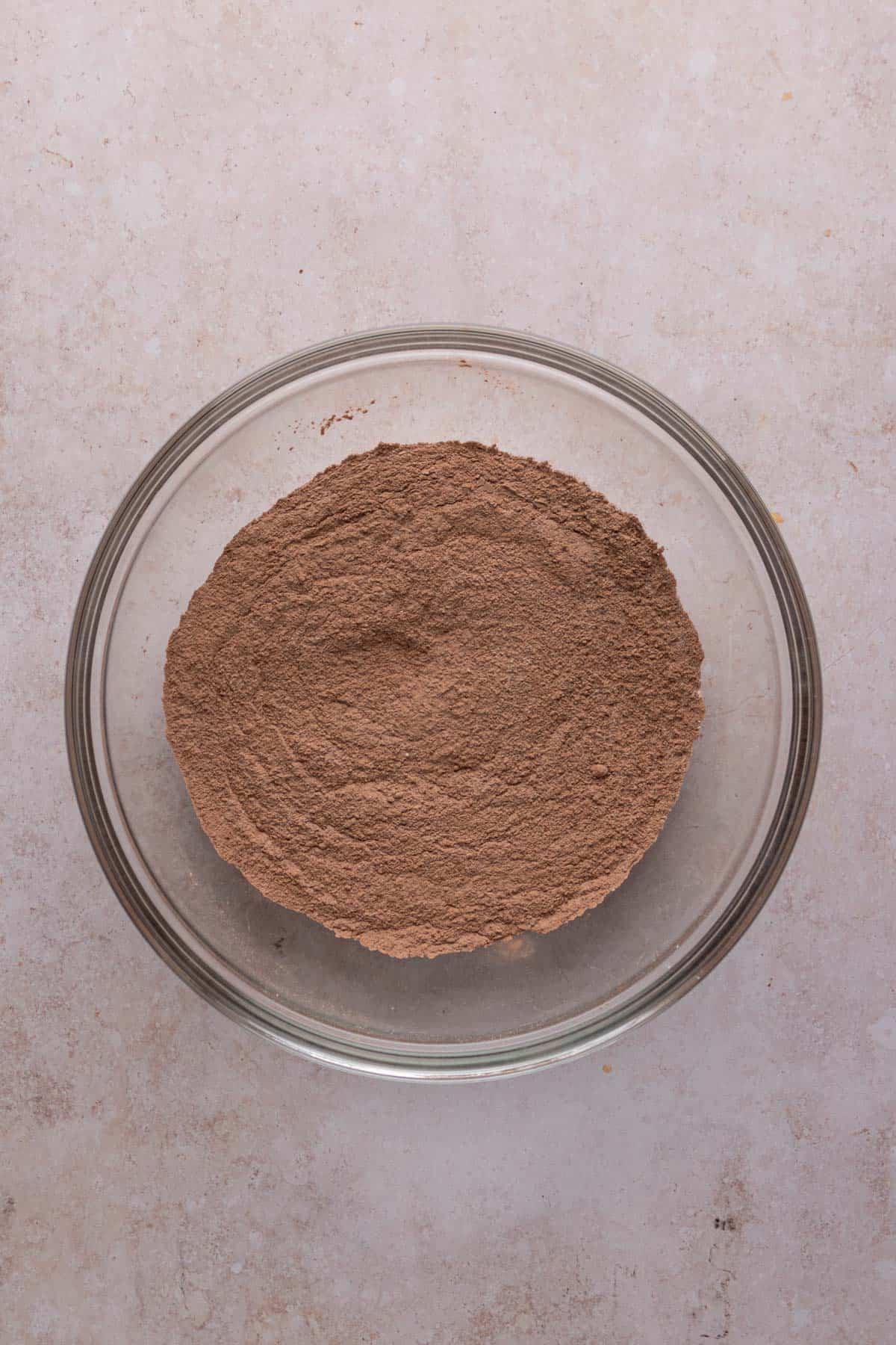 Whisked dry ingredients for chocolate cupcakes in a bowl.