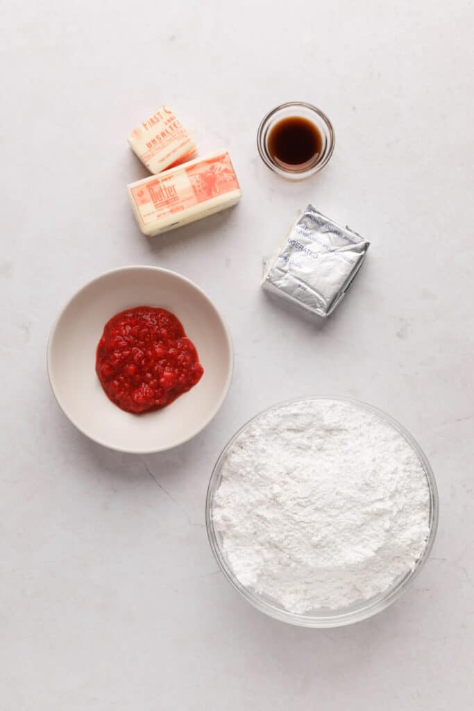 Ingredients for whipped strawberry cream cheese frosting.