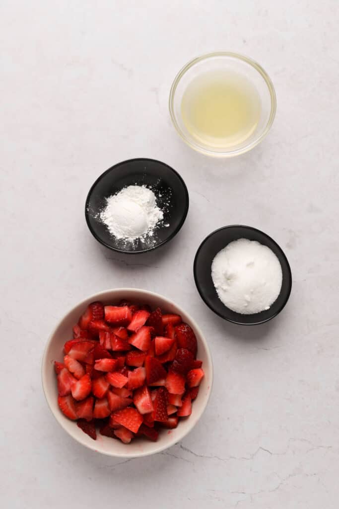 Ingredients for strawberry filling for strawberry cupcakes.