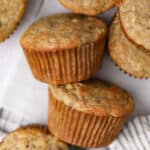 Overhead shot of a close of up stacked sour cream banana muffins.