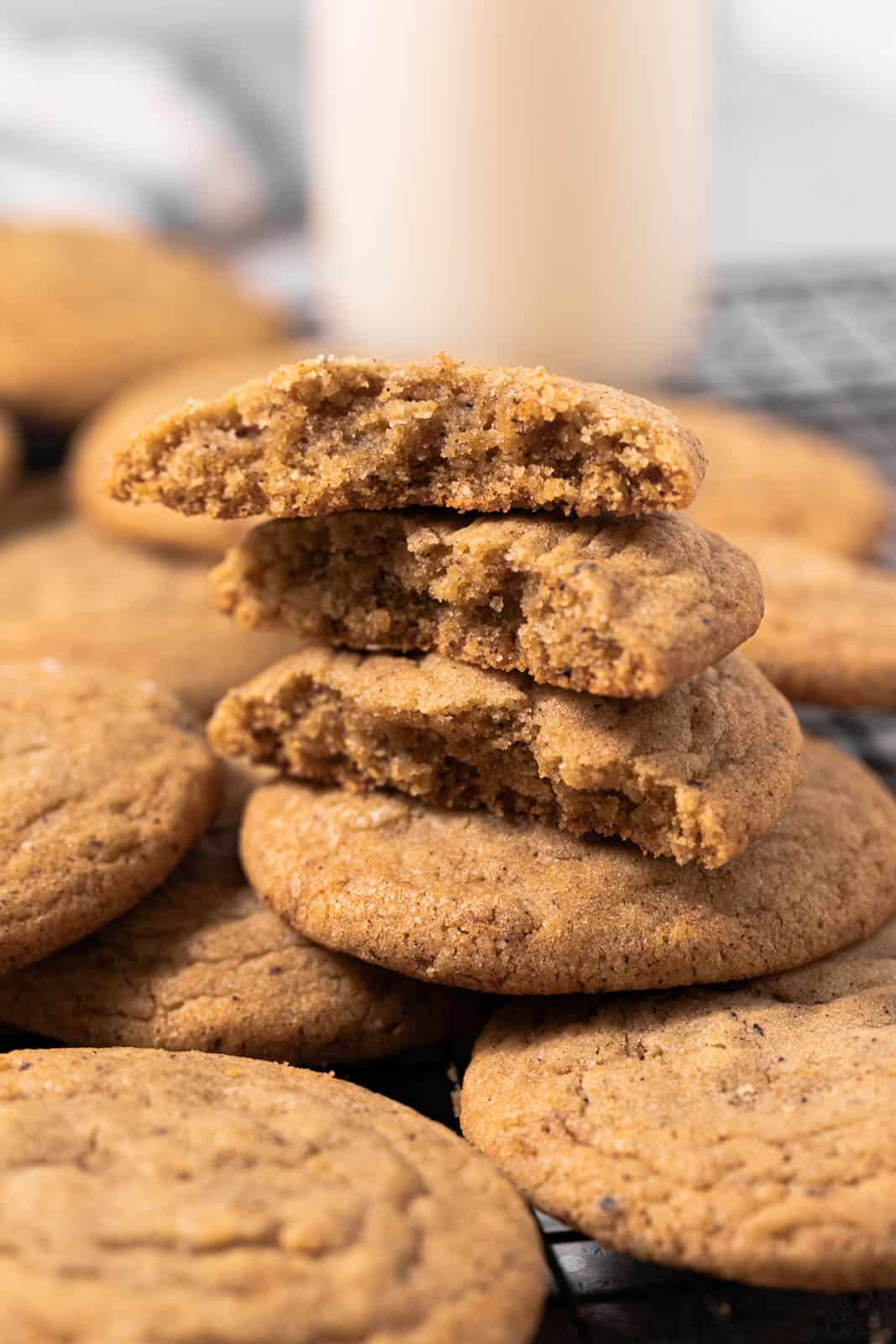 Close up of a stack of chocolate chipless cookies broken in half.